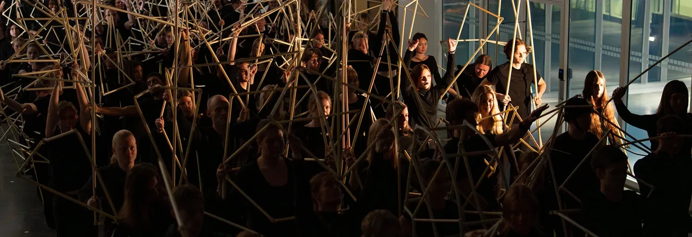 students performing in a dark environment