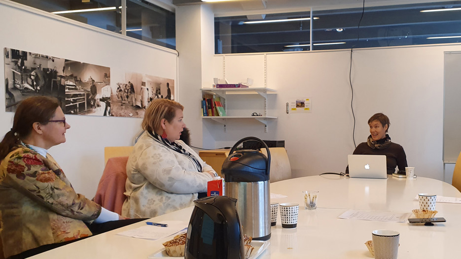 Eija Timonen, Satu Miettinen and Katrin-Holmqvist Sten engaged in discussion at the Umeå School of Fine Arts