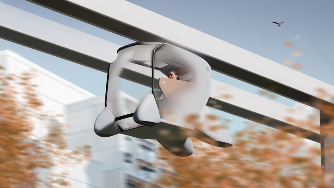 BMW Sense exists in symbiosis with urban nature corridors as it travels by rail suspended in the air for longer distances and on the ground for first- and last mile transport.