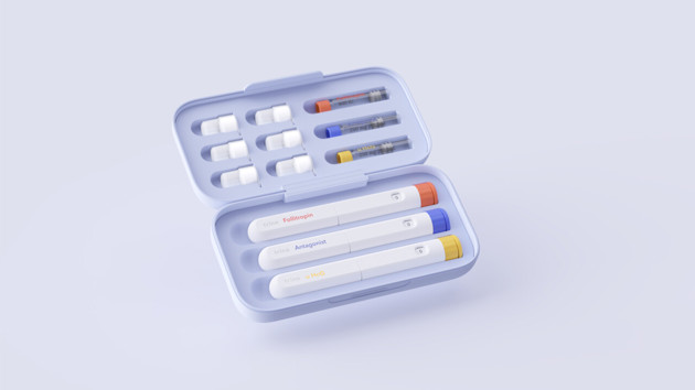 Case for storage and transport of medications. The three pens are color coded according to the type medication.