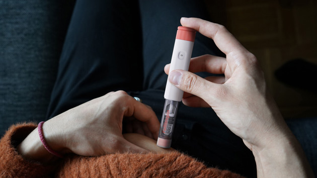 Patient injecting Follitropin.